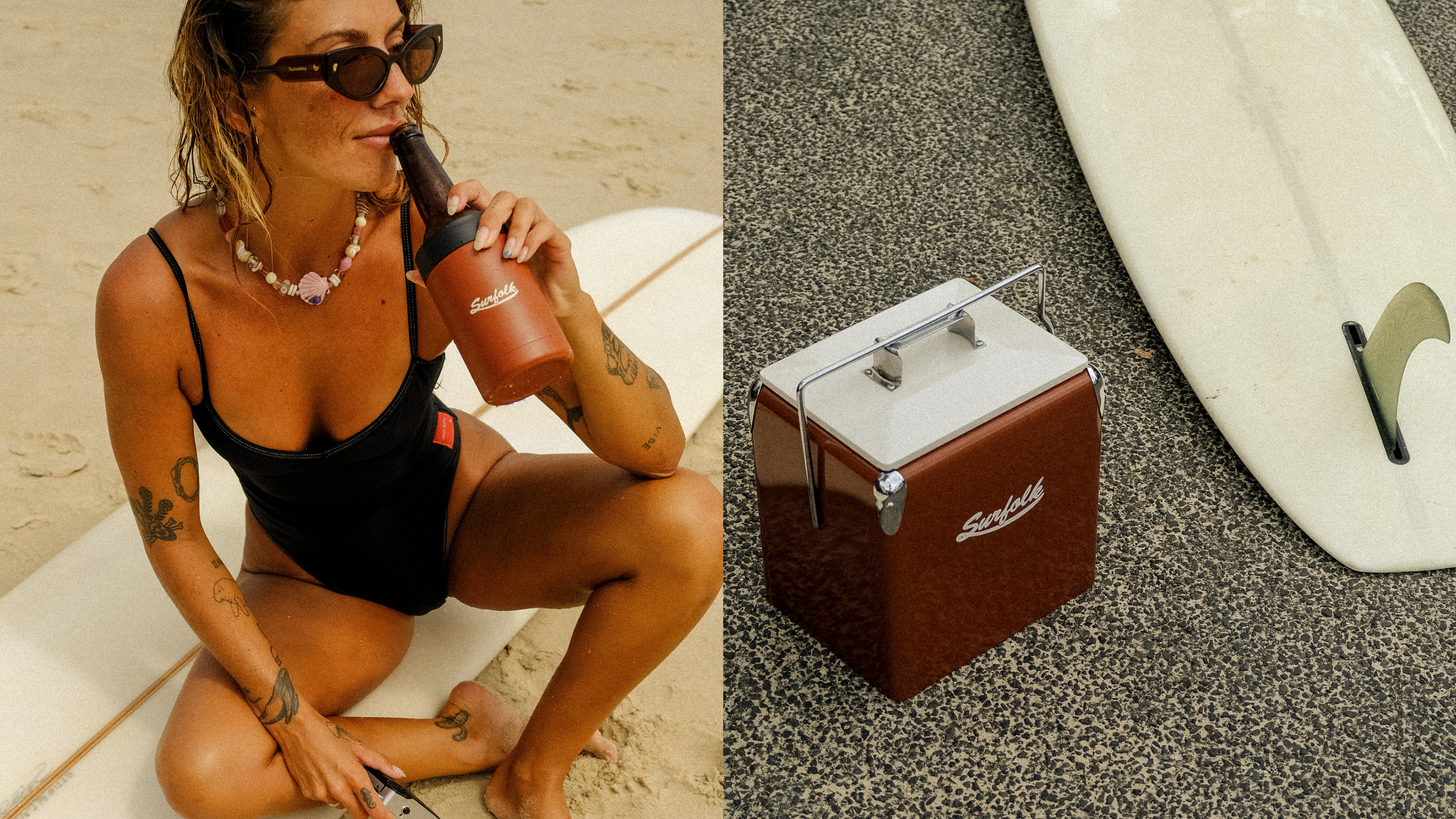 Woman in black swimsuit sitting on a surfboard next to a brown Surfolk retro cooler.